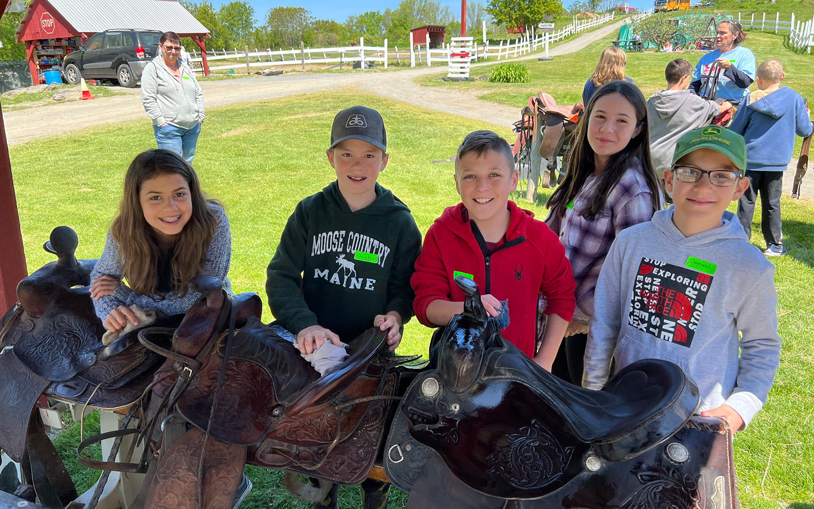 Elementary students at a horse farm