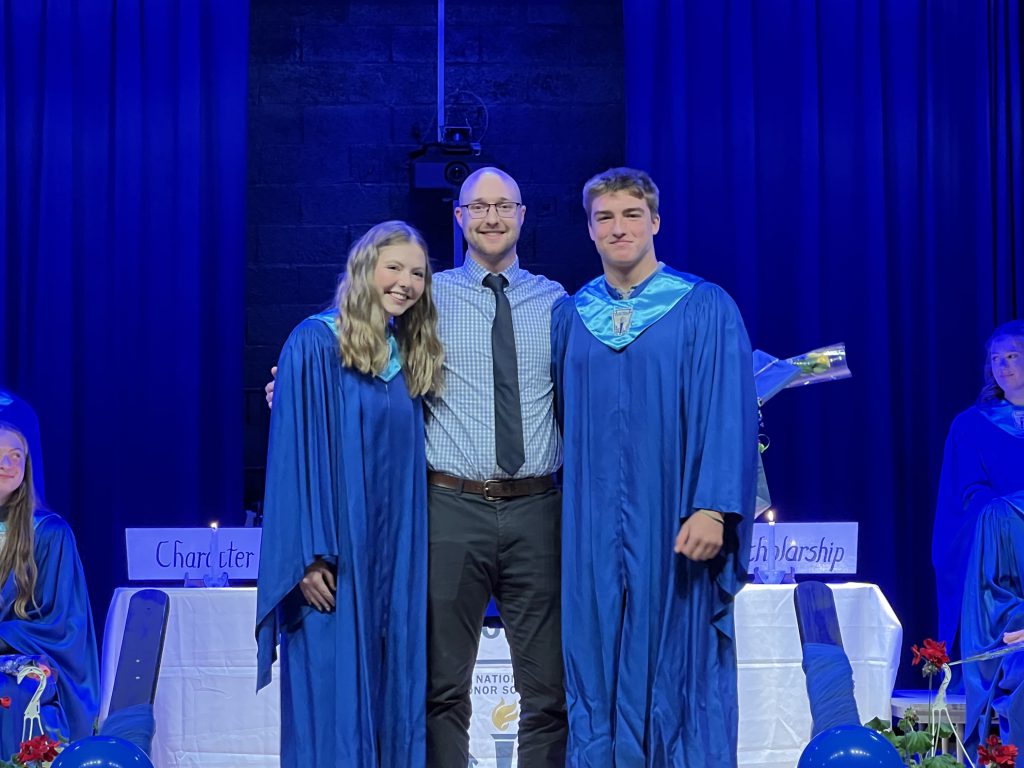 From left: Ella Hunt, JT Sawyer (faculty recipient), Deacon Schneider