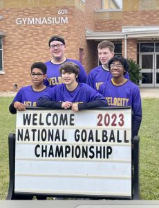 Jaron with his goalball team at the 2023 National Championships