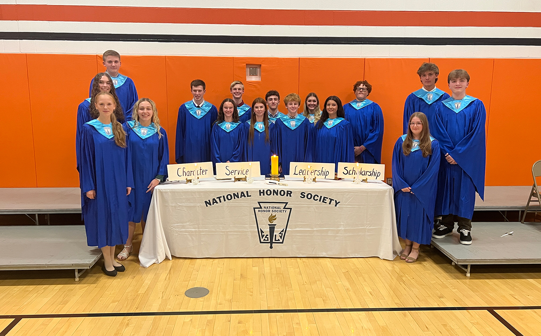 National Honor Society inductees with the current members