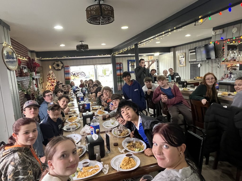 Spanish students eating at a restaurant 