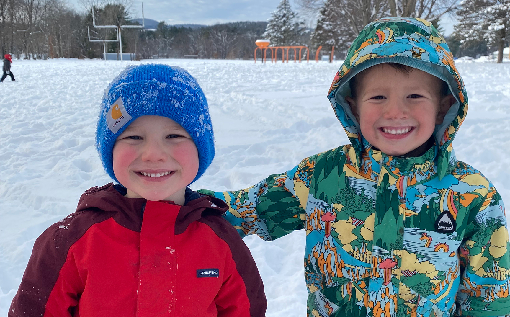 Elementary boys in the snow at recess