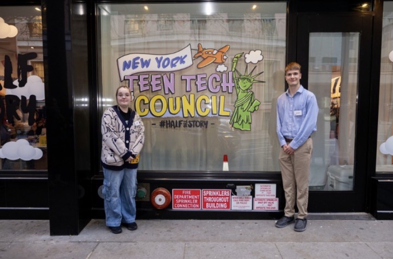 Addison Barton and Jack Rufo at the New York Teen Tech Council window display in New York City
